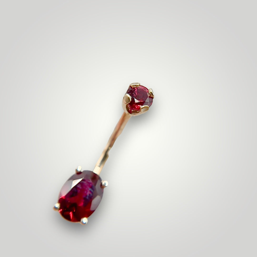 Oval Navel Curve with Dark Ruby in 14kt Yellow Gold