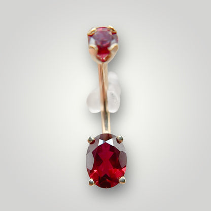 Oval Navel Curve with Dark Ruby in 14kt Yellow Gold