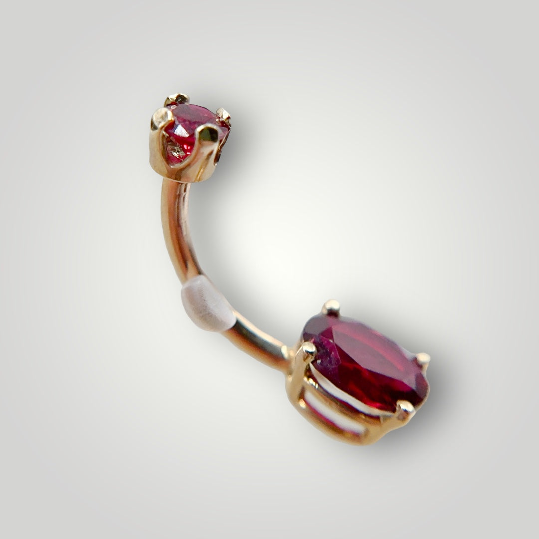 Oval Navel Curve with Dark Ruby in 14kt Yellow Gold